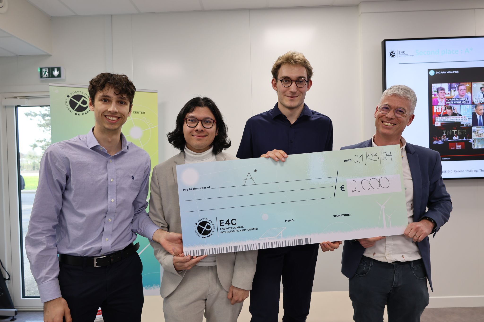 Three representatives of the A* team with Philippe Drobinski, Founding Director of E4C - Photo credits: E4C